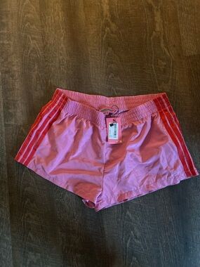 Edikted Pink Athletic Shorts with Red Trim